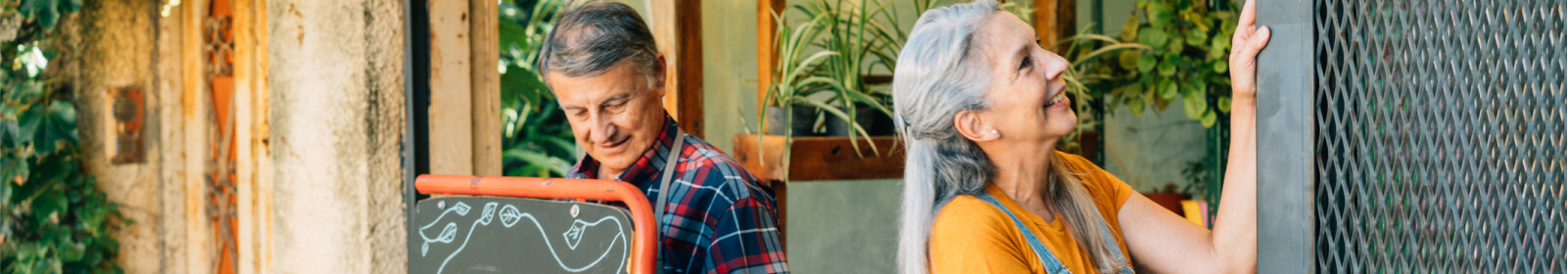 Man and woman opening a business for the day